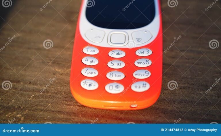 un telephone portable belge sur un fond colore