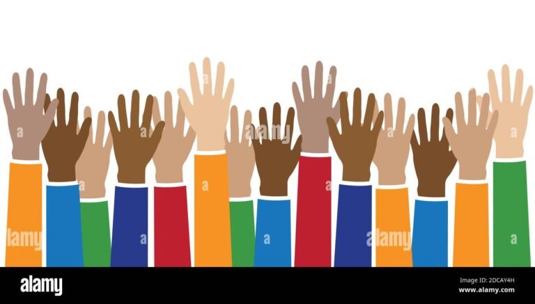 une main levant une affiche coloree